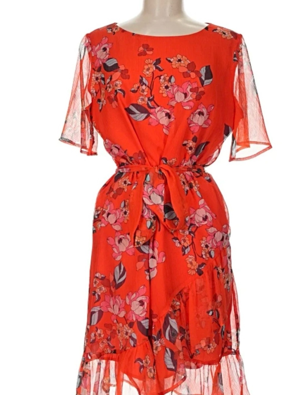 Red chiffon style floral dress with ruffle at the bottom